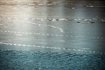Frozen surface of Jarun lake in Zagreb city, Croatia with tracks left over by ducks and water birds