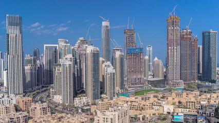 Futuristic aerial cityscape timelapse with modern architecture of Dubai downtown, United Arab Emirates.
