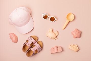 Kids summer accesories for sunny days and vacations. Sunglasses, sandals, sand molds for beach fun...