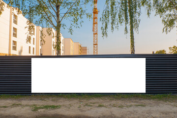 Advertising banner mock-up on the fence of construcion site