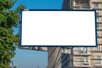 Blank white advertising billboard on the construction site area