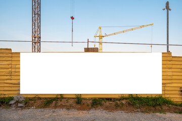 Advertising banner mock-up on the fence of construction site.