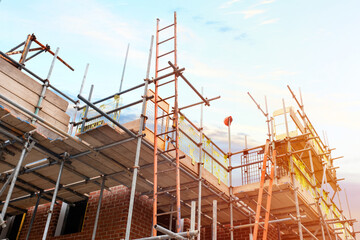 Scaffolding around houses on a new housing development