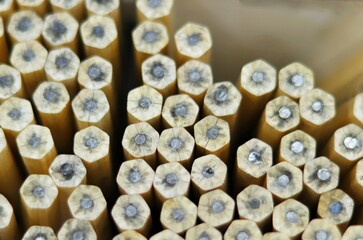 A box of unsharpened pencils in a store