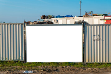 Blank white billboard for advertisement on the construction site © diesirae