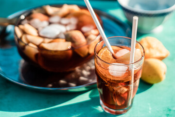 Crystal glass with homemade Sangría, with fruit and ice. 
