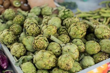 Fresh artichokes on sale at the local market.