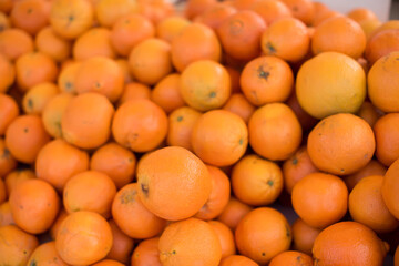 Oranges on sale at the local market. Oranges background