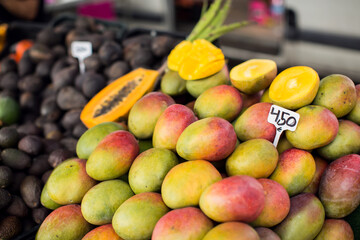 Fresh papaya at food market. Tropic fruit