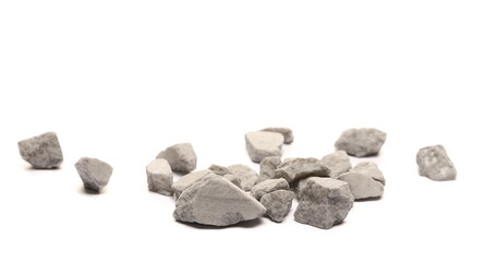 Gray rocks pile isolated on white 