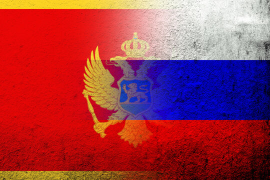 National flag of Russian Federation with National flag of Montenegro. Grunge background