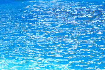 Small ripples on the surface of blue water