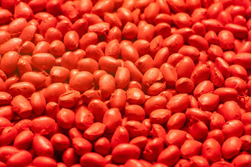 Red polymer dye in granules, background texture