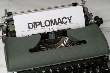 Diplomacy written on a paper in a type writer