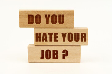 On a white surface are wooden blocks with the inscription - DO YOU HATE YOUR JOB
