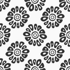 Abstract vector seamless floral pattern. Simple background with hand drawn stylized flowers. Flat design style. Black and white floral background.