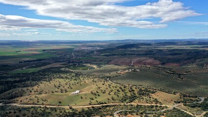 Fototapeta na wymiar survol du Guadalquivir et de terres agricoles et d'une retenue d'eau, barrage hydroélectrique en Andalousie dans le sud de l'Espagne 