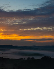 Fototapeta na wymiar Tuscany, Italy, sunrise, dramatic, beautiful clouds