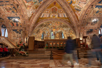 Assisi Italy 2022Faithful visiting the lower basilica of San Francesco d'Assisi, beautifully...