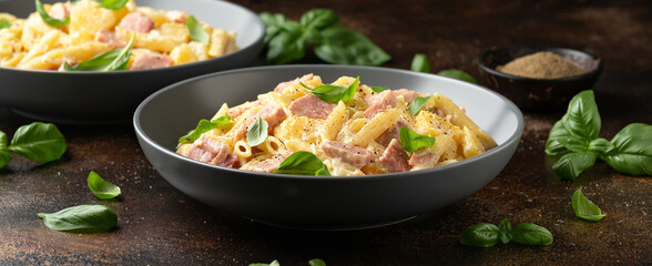 Hawaiian pasta with ham, pineapple and creamy cheese.