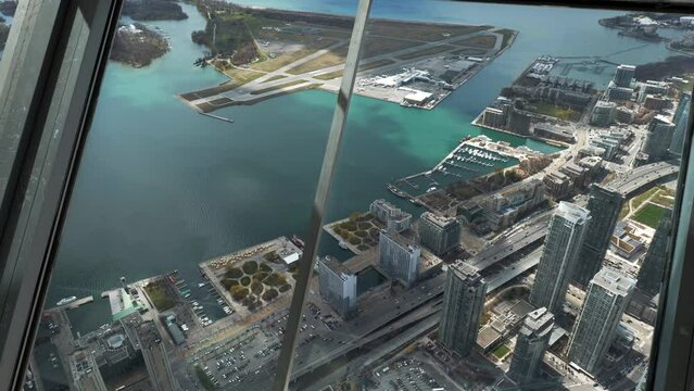 Looking southwest from CN Tower, condos, harbour,  lake Ontario, Gardiner Expressway, Billy Bishop island airport