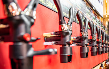 various types of craft beer tap are served in the beer store or bar