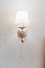 Beautiful classic sconces with a lampshade for a classic retro interior.