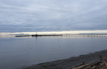 Fototapeta premium Tranquil wooden pier in the evening light