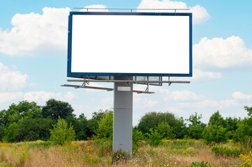 Advertising billboard mock-up in front of the bushes. Concept of investment areas