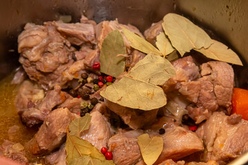 Beef stew in Burgundy. With carrots, onions, peas and champignons in wine. View from above