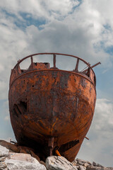 Plassey shipwreck on shore of Inisheer island. Aran islands, county Galway, Ireland. Rough stone...