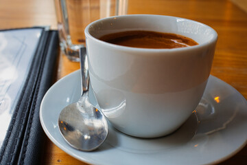 Espresso Tasse Kaffee, mit Löffel,   Symbolbild , Symbol 