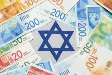 New Israeli shekels banknotes with various nominals. NIS - New shekel laying on israel national...