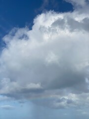 Fototapeta na wymiar Rainbow over the Waikiki beach area, view from the Ala Moana hotel, Oahu island Hawaii, year 2022