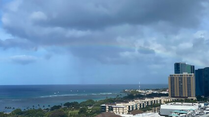 Rainbow over the Ala Moana beach, view from the Ala Moana hotel, Oahu island Hawaii, year 2022