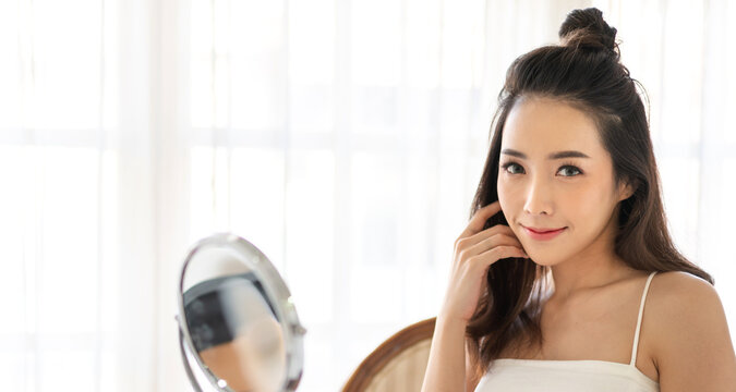 Beautiful smiling of young beauty pretty asian woman clean fresh healthy white skin facial treatment.asian girl model with fashion makeup skin care treatment cosmetic.spa and beauty concept