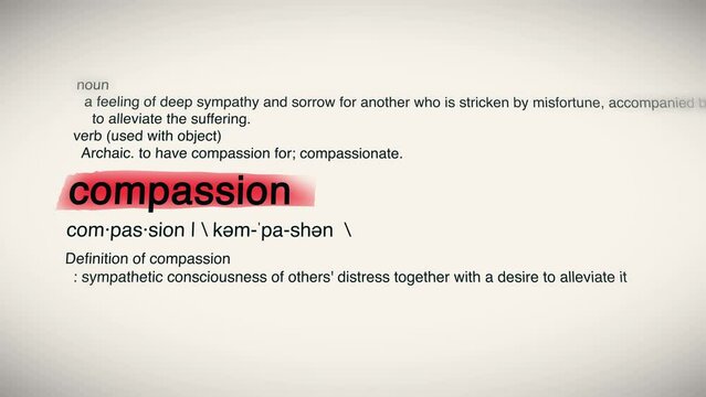 The Word Compassion Red Highlighted in a Dictionary Animation.