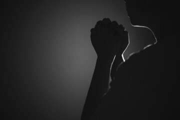 Black and white prayer hands