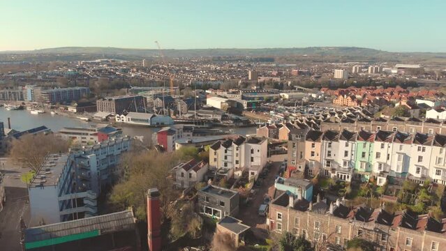Aerial view of buildings surrounding River Avon in Bristol harbourside