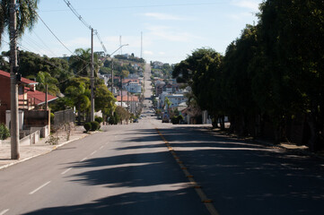Fototapeta premium Photograph of a street on a smite day