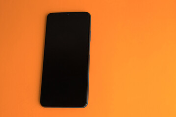 Naklejka premium New cell phone over colorful background