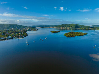 Morning fog drifting over the mountains by the bay
