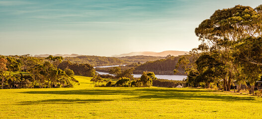 Sunset over the Frankland River. Farmland and fence-line in foreground. Nornalup-Walpole Western...