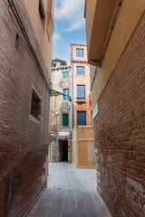 The narrow streets of the old city of Venice, Italy.