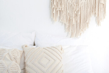 Wall panel in the style of Boho made of cotton threads in natural color using the macrame technique...