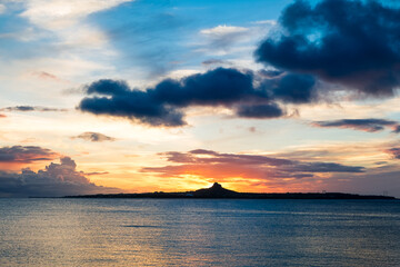 Fototapeta na wymiar Beautiful sunset around the distant sea island
