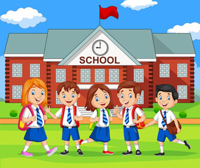Happy school children in front of building school