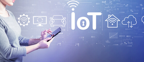 IoT theme with business woman using a tablet computer