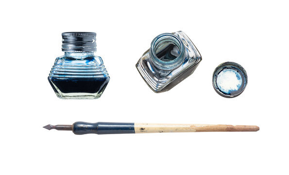 Inkwell and dip pen isolated on white with clipping path