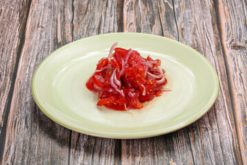 Uzbek salad Achichuk with tomato